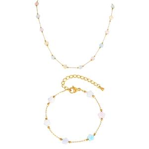 Golden necklace and bracelet set featuring colorful star shell beads for women