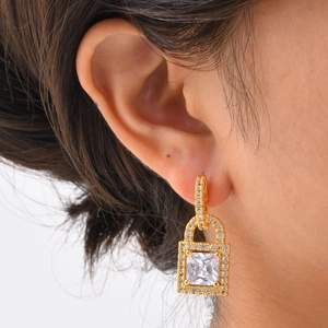 Women fashion gold padlock earrings with square zircon and pave rhinestones on model
