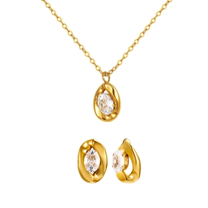 Gold oval jewelry set featuring twisted frame white zircon necklace and earrings