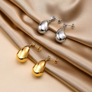 Boucles d'oreilles gouttes d'eau creuses polies en or et argent avec zircons