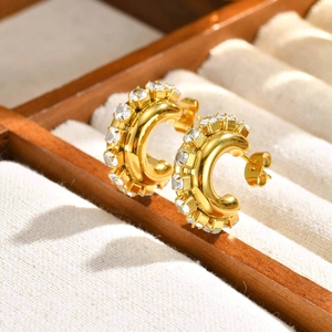 Golden C-shaped stainless steel earrings with sparkling round cubic zirconia stones