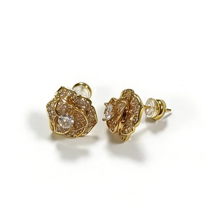 Elegant gold rotating rose stud earrings with shimmering petals and cubic zirconia