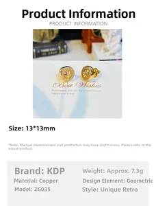 Detail view of gold starburst compass stud earrings with technical product parameters