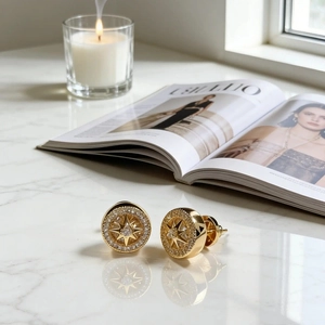 Star Compass Gold Plated Earrings with Diamond Halo Inlay on Elegant Marble Surface