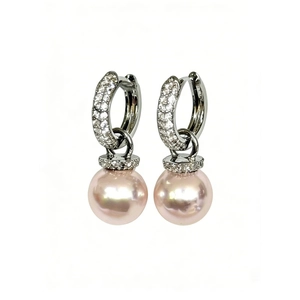 Elegant baroque pink pearl earrings with silver pave zirconia hoops on white background