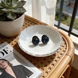 Vintage dark blue zircon stud earrings with faceted gemstone and black crystal halo