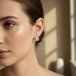French style silver earrings with a square crystal and micro-diamonds on a female model