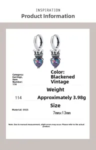 Detailed view of S925 silver crown earrings with colorful heart-shaped gemstones