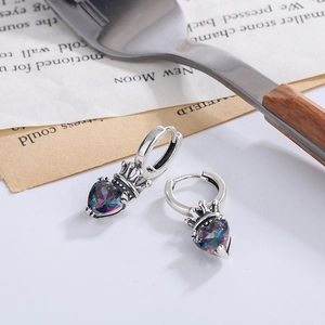 Vintage S925 silver crown earrings with rainbow heart gemstone shown in classic still life