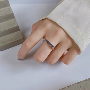 S925 sterling silver triple row blue zircon ring worn on finger in minimalist style