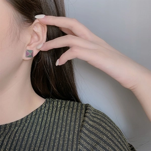 925 silver pyramid stud earrings featuring pink and green pave cubic zirconia accents