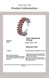Détail macro de bague réglable en argent S925 avec pierres marquises rouges et fini vintage