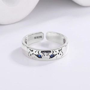 Vintage 925 sterling silver leopard ring with blue eyes and adjustable open band design