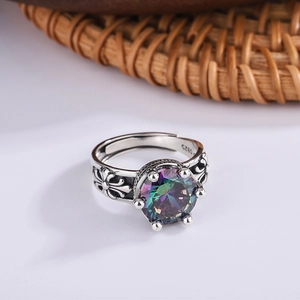 Detail of S925 sterling silver crown ring featuring colorful zircon and vintage engraving