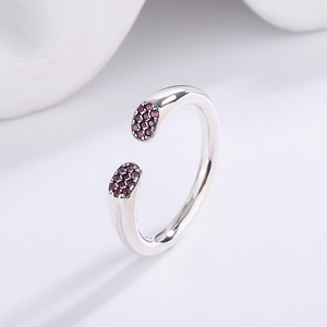 S925 sterling silver adjustable open ring featuring curved ends with pink cubic zirconia