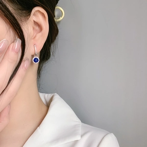 S925 silver long drop earrings with round blue sapphire and sparkling zircon accents