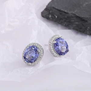 Boucles d'oreilles en argent S925 avec pierre violette ovale et halo de diamants