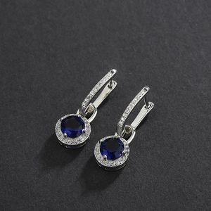 Elegant S925 sterling silver drop earrings with round blue sapphire and crystal halo