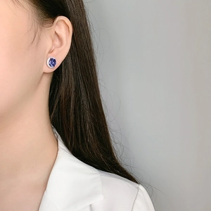 Boucles d'oreilles en argent s925 avec pierre bleue ovale et sertissage en diamants