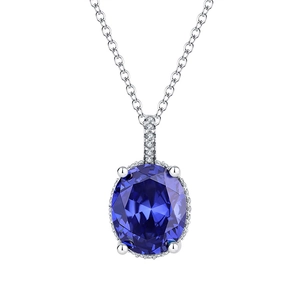 Elegant Heart of the Ocean necklace with a deep blue oval sapphire pendant and silver chain