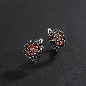 Vintage S925 sterling silver floral earrings with red zircon and black marcasite stones