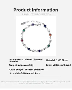 Macro detail of S925 silver heart bracelet with colorful round 5mm zircon gemstones