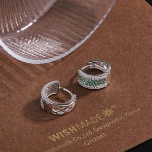Luxury geometric hoop earrings with green micro-pave zircons and silver X-texture