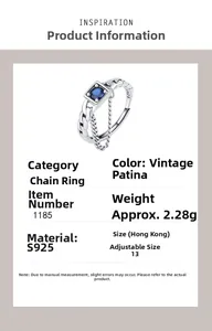 Detail of S925 sterling silver chain ring with square blue gemstone and vintage finish