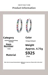Macro shot of 24mm S925 sterling silver hoop earrings with colorful zircon stones