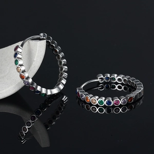 S925 silver large hoop earrings with colorful round cubic zirconia on black mirror surface
