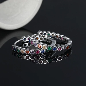 Rainbow hoop earrings in 925 sterling silver with colorful cubic zirconia on black base