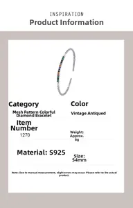Detail view of S925 silver retro bracelet with colorful zircon stones and mesh texture