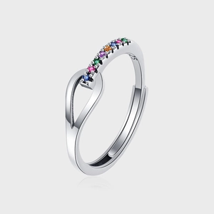 Macro shot of S925 sterling silver stamp and colorful stones on minimalist ring
