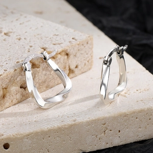 Polished S925 sterling silver geometric hoop earrings with twisted U-shape design