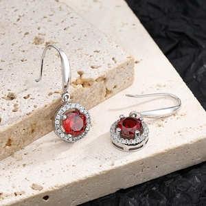 Classic S925 silver hook earrings with faceted round garnet stones and halo crystals