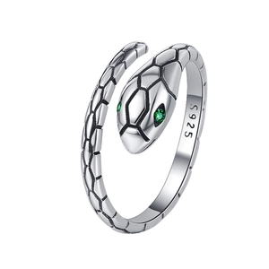 Vintage 925 sterling silver snake ring with green gem eyes and textured scales