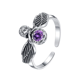 Vintage 925 sterling silver angel wing ring featuring a central purple zircon stone