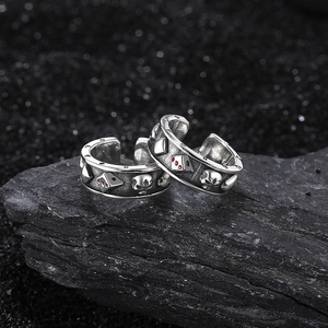 Retro S925 silver open ring featuring skull and dice relief on dark natural stone