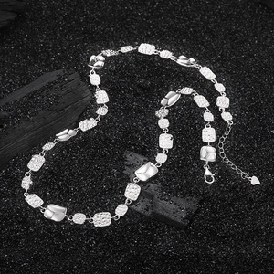 S925 sterling silver square link chain necklace with hammered texture on black background