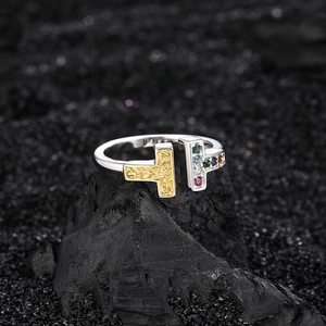 Dual T-shaped silver open ring with gold floral relief and colorful zircon stones