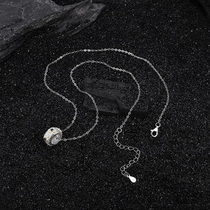 S925 sterling silver cylinder necklace with gold star engraving and blue gemstone