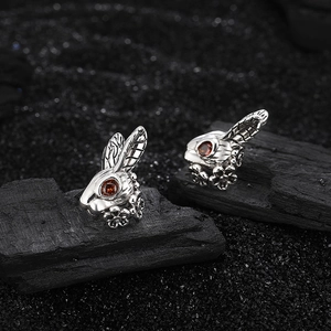 Vintage s925 silver rabbit stud earrings with red zircon eyes on dark charcoal base