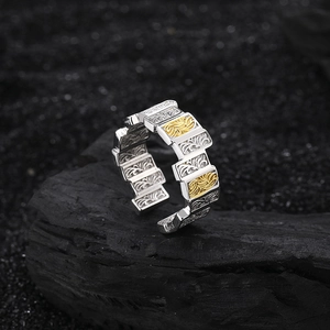 S925 sterling silver two-tone open ring with intricate arabesque pattern on black stone
