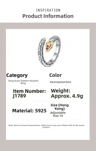 Detailed view of S925 silver snake ring with gemstone eyes and ornate engravings
