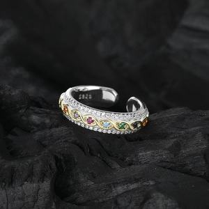 Luxurious S925 sterling silver open ring featuring colorful gemstones and golden accents