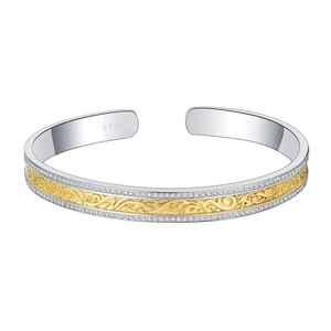 S925 sterling silver open bangle with gold-tone filigree vine pattern and pave zircons