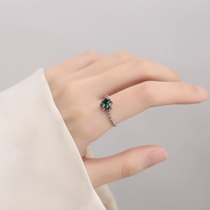 Elegant S925 silver ring featuring a square green zircon with vintage vine band design