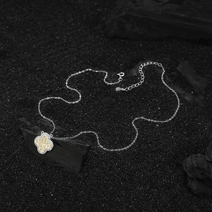 S925 sterling silver clover necklace with gold filigree and crystals on black stones