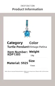 Detailed close-up of S925 sterling silver sea turtle pendant with a blue zircon gemstone