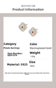 Detail view of s925 silver petal stud earrings with red zircon and two-tone gold plating